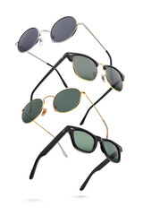Different classic sunglasses isolated on white. © Kuzmick