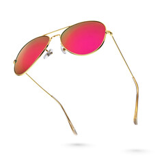 Pink aviator sunglasses with golden frame isolated on white.
