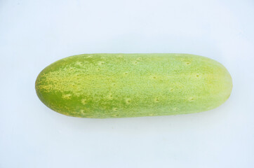 the ripe green cucumber isolated on white background.
