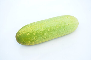 the ripe green cucumber isolated on white background.