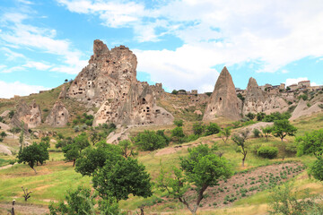 Fototapeta na wymiar Carved houses in rock, Pigeon Valley, Uchisar, Cappadocia, Turkey