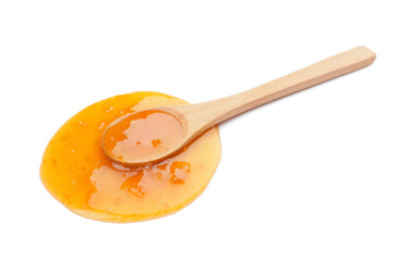 Spoon with tasty apricot jam on white background
