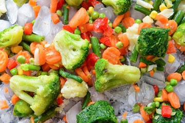 Mix of frozen vegetables as background