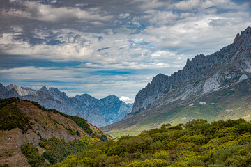 Mountainous landscape with cloudy skies