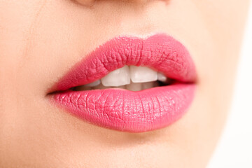 Beautiful young woman with bright lips, closeup