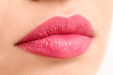 Beautiful young woman with bright lips, closeup