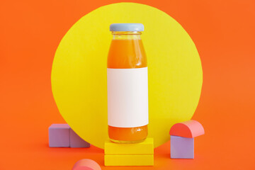 Bottle of juice on color background