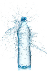 Bottle and splash of water on white background
