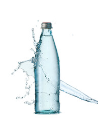 Bottle and splash of water on white background