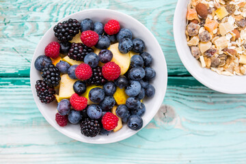 Bowl of muesli with fresh berries.