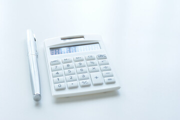 Calculator on a white desk