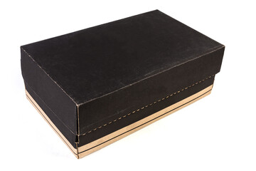 Closed black cardboard shoe box on a white background