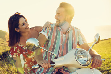 Friends traveling on their motorcycle and enjoying the summer