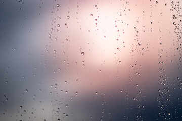 Transparent glass rain drops after a rainy day