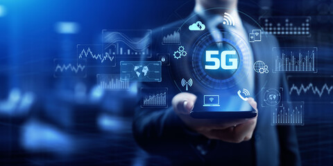 5G mobile internet connection five generation networking concept. Businessman pointing virtual screen.