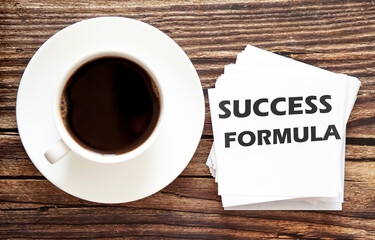 Word writing text SUCCESS FORMULA . Business concept for Urgent Move.Text in stickers with a cap of coffee