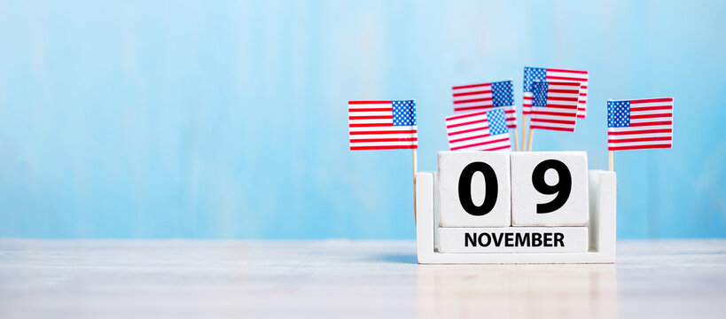 9 November Of White Calendar With United States Of America Flag On Wood Background. Veterans Day 2020 And Holiday Concept