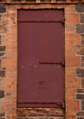 Old Single Steel Door with Stone Walls
