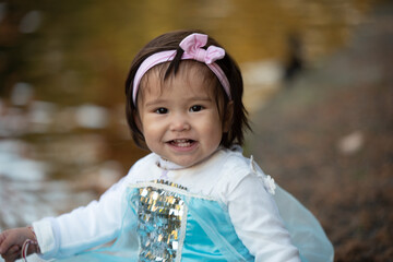 little princes girl playing in the park