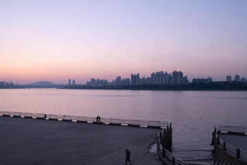 seoul sunset skylines with people in it