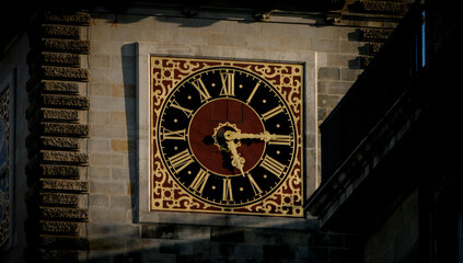 Clock face on old tower building