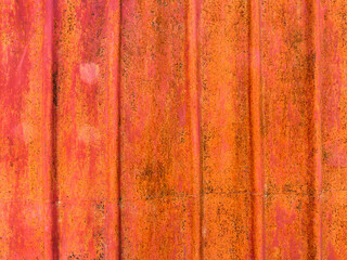 Creative background of rusty metal, painted gray paint carelessly with the remnants of torn paper....