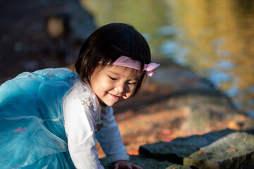 little princes girl playing in the park