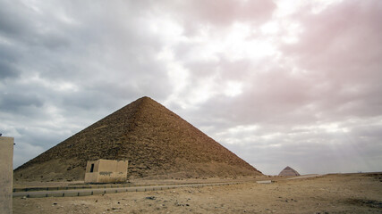 Fototapeta na wymiar Red Pyramid in Saqqara Complex of Egypt landmark early pyramid building history