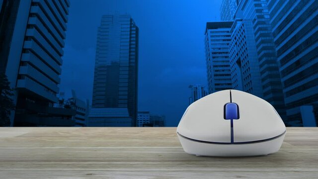 cctv camera flat icon with wireless computer mouse on wooden table over modern office city tower and skyscraper, Business security and safety online concept