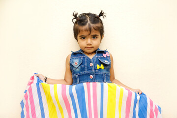 Cute Indian girl child showing cute expression