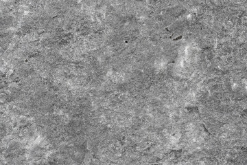 Broken concrete background with cracks and wrinkles