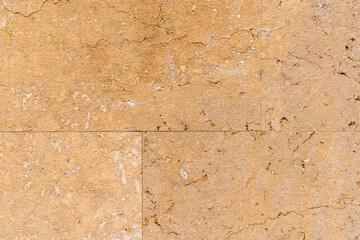 Old weathered wall tile with cracks