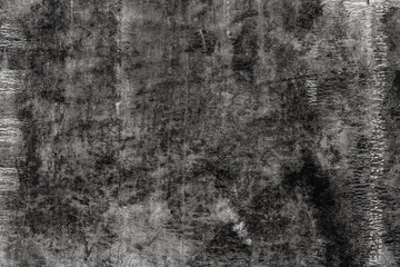 Fototapeta premium Black texture of old roofing material. Weathered mottled shabby building material with cracks