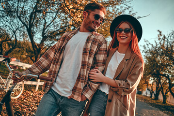 Couple in park in autumn