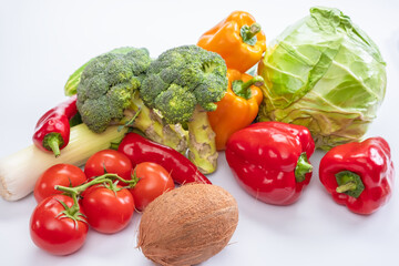 Fresh vegetables on the white background.