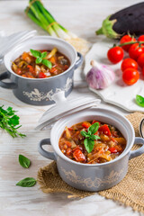 Delicious Italian vegetable minestrone soup with ingredients