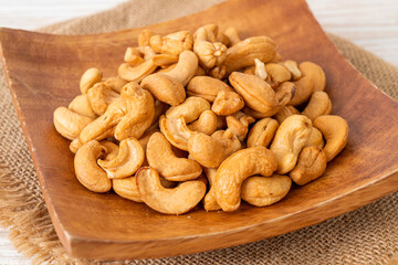 Cashew nuts in wooden bowl