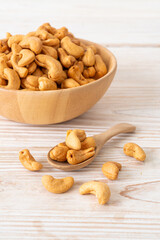 Cashew nuts in wooden bowl
