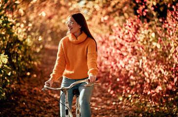 Woman in park in autumn