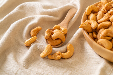 Cashew nuts in wooden bowl