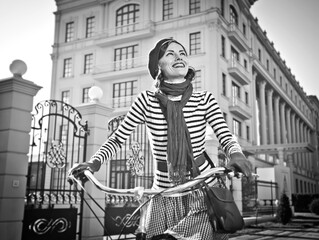 women on the bike, retro, skirt, street. Girl on bike, enjoy sunny autumn or spring day
