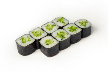 Sushi roll with cucumber on a white plate, classic Japanese sushi. Traditional Japanese food with maki. Delicious pieces of sushi. For the restaurant menu. copyspace