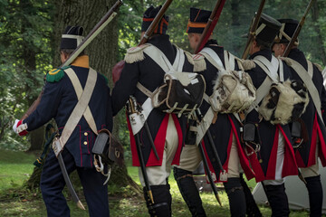 Napoleonic soldiers train to march in the forest