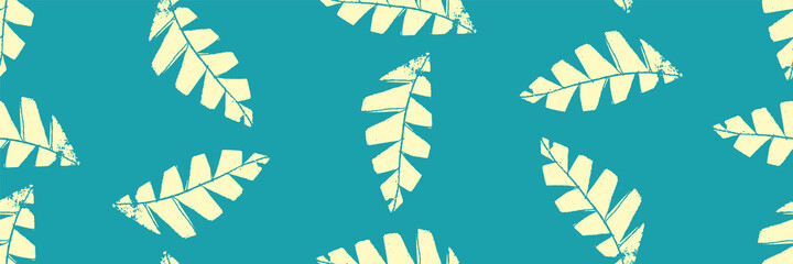 Fototapeta na wymiar Mono print style scattered leaves seamless vector border background. Banner of textured cut out yellow foliage on aqua blue backdrop. Hand crafted painterly stamp design. For summer products