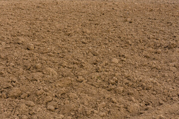 Background of the plowed field prepared for sowing