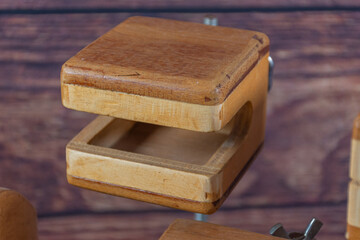 Close up of wood block on wood color background