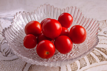 red tomatoes in a bowl