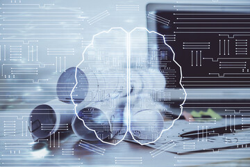 Double exposure of table with computer and brain hologram. Data innovation concept.