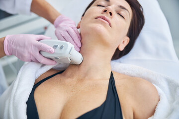 Female patient daydreaming during the ultrasound therapy
