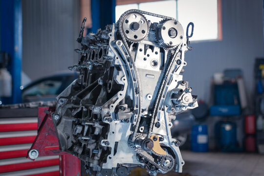 overhaul of the motor. partially disassembled engine in car service